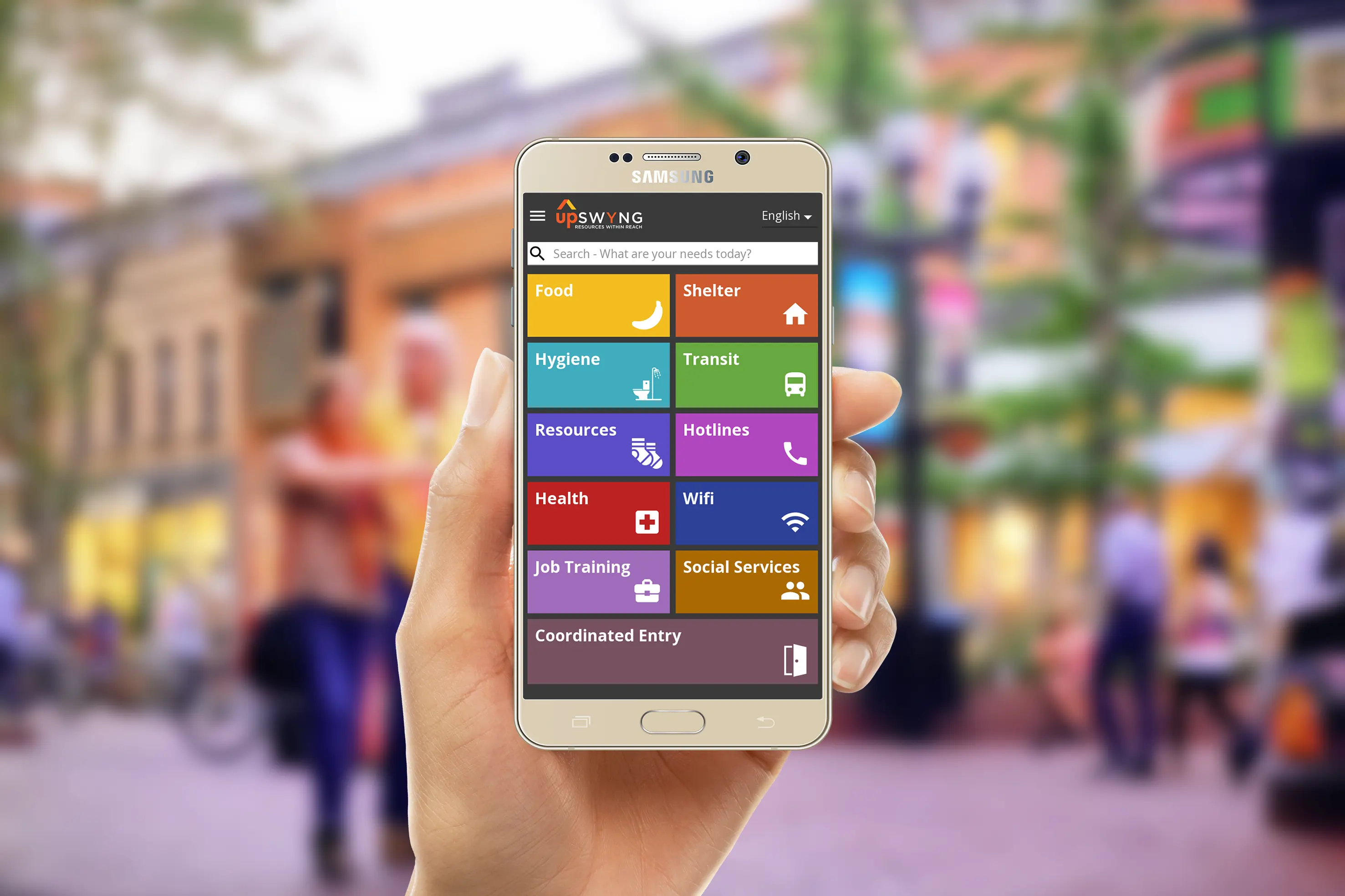 UpSwyng's home page on a phone containing a search input and food, shelter, hygiene, transit, resources, hotlines, health, Wifi, job training, social services, and coordinated entry buttons